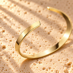 Power Couple macro close-up: the thin flat open gold cuff