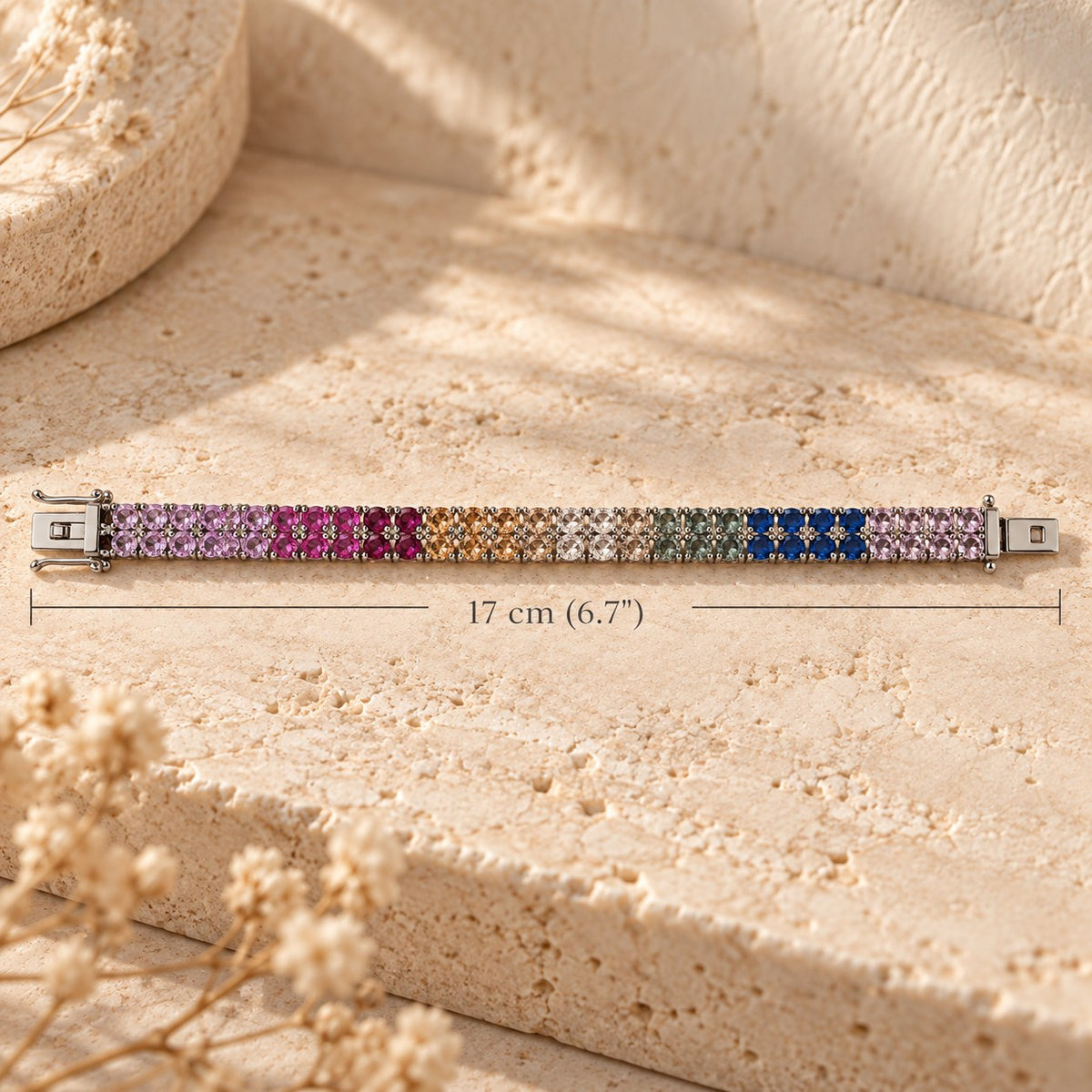 Color Theory rainbow tennis bracelet laid flat with a 17 cm (6.7 inch) length measurement