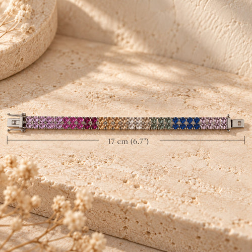 Color Theory rainbow tennis bracelet laid flat with a 17 cm (6.7 inch) length measurement