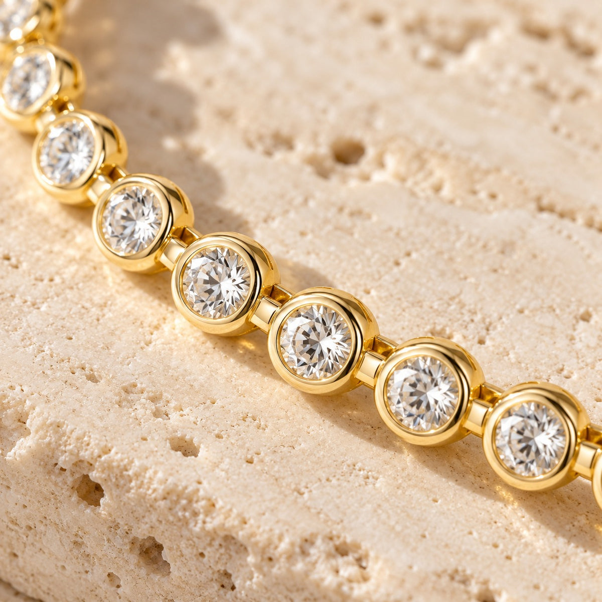 Close-up of the Circle Back round stones, each in a polished gold bezel