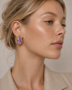 Organic Glow Purple cabochon earrings worn on model