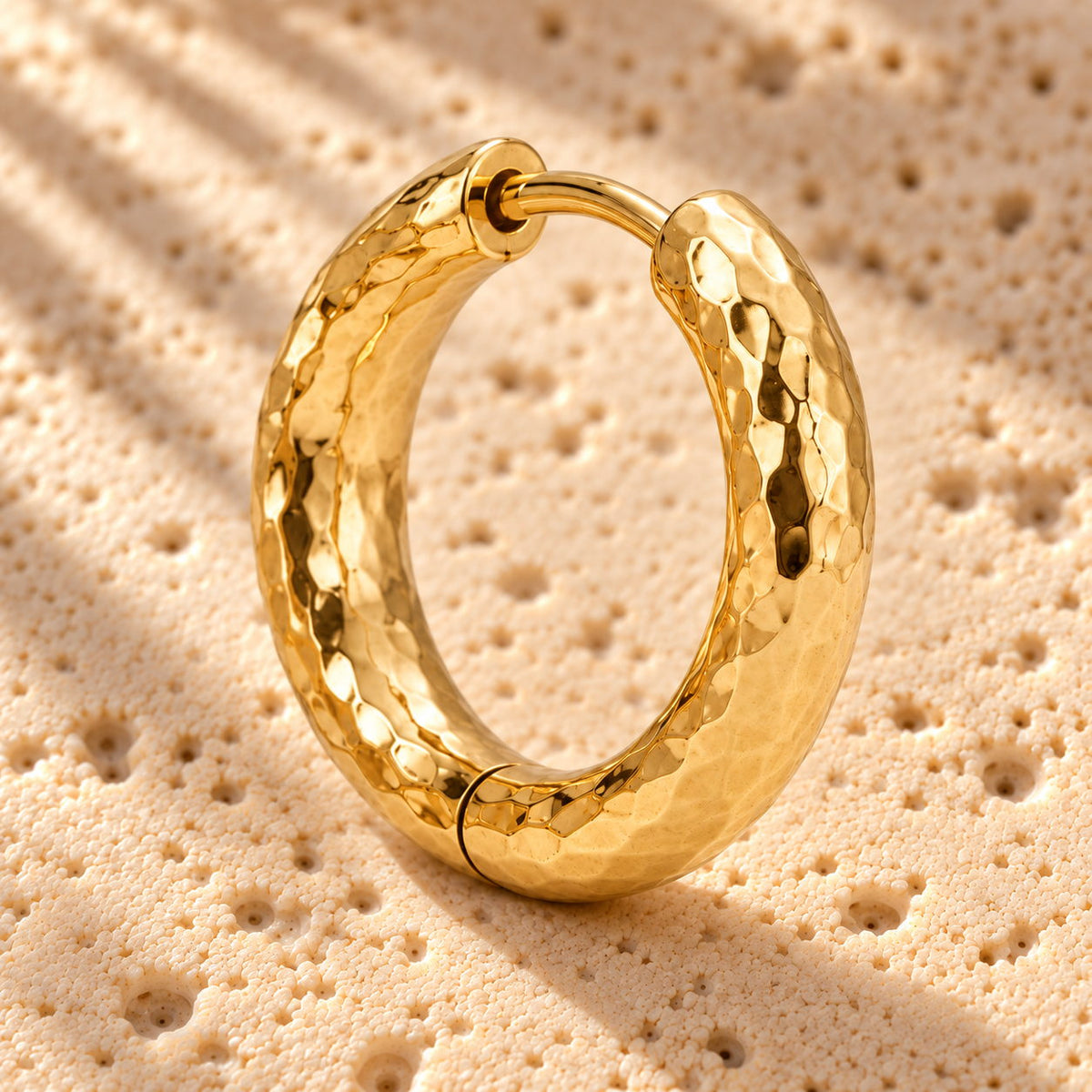 Hoop Dreams Style 1 macro close-up: hammered gold hinged hoop and its polished hinge