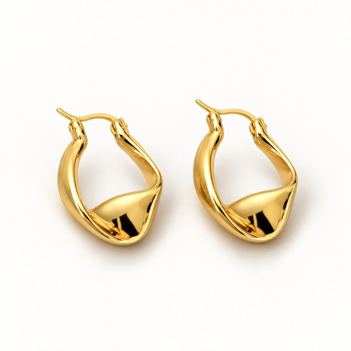 Plot Twist chunky twisted gold hoop earrings in 18K gold over sterling silver