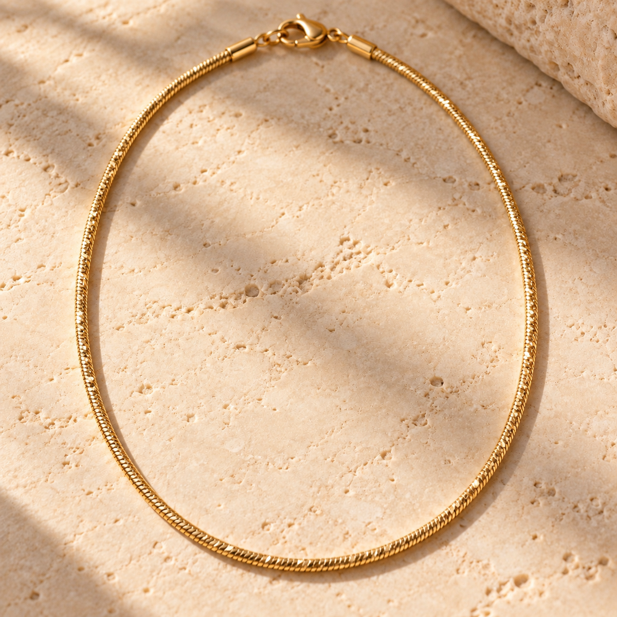 The Bottom Line Look: the Bar None Diamond-Cut Snake Chain, Thin Margin bracelet and Black Tie
