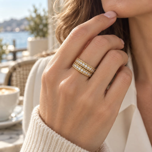 Two White Tie bands stacked on one finger