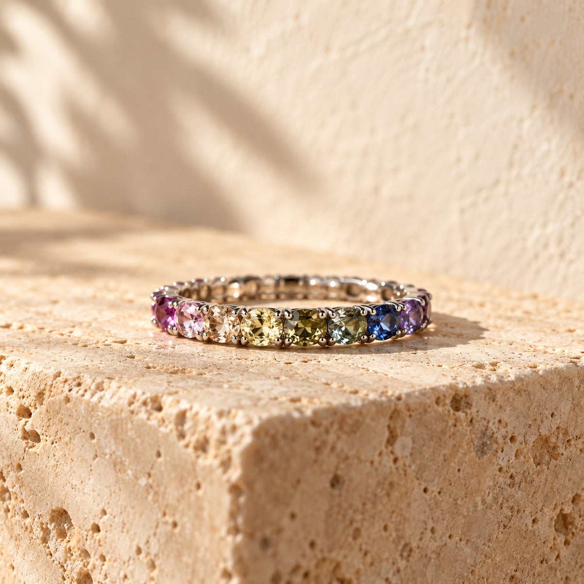 Full Spectrum sterling silver eternity ring set with cushion-cut rainbow stones