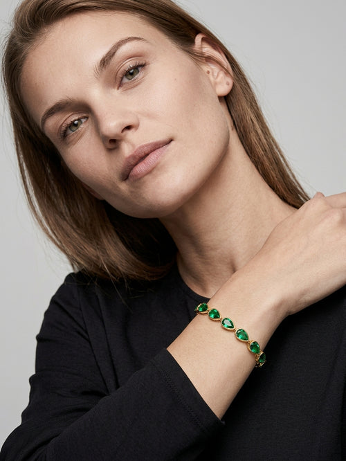 Green With Envy emerald teardrop bracelet worn on model