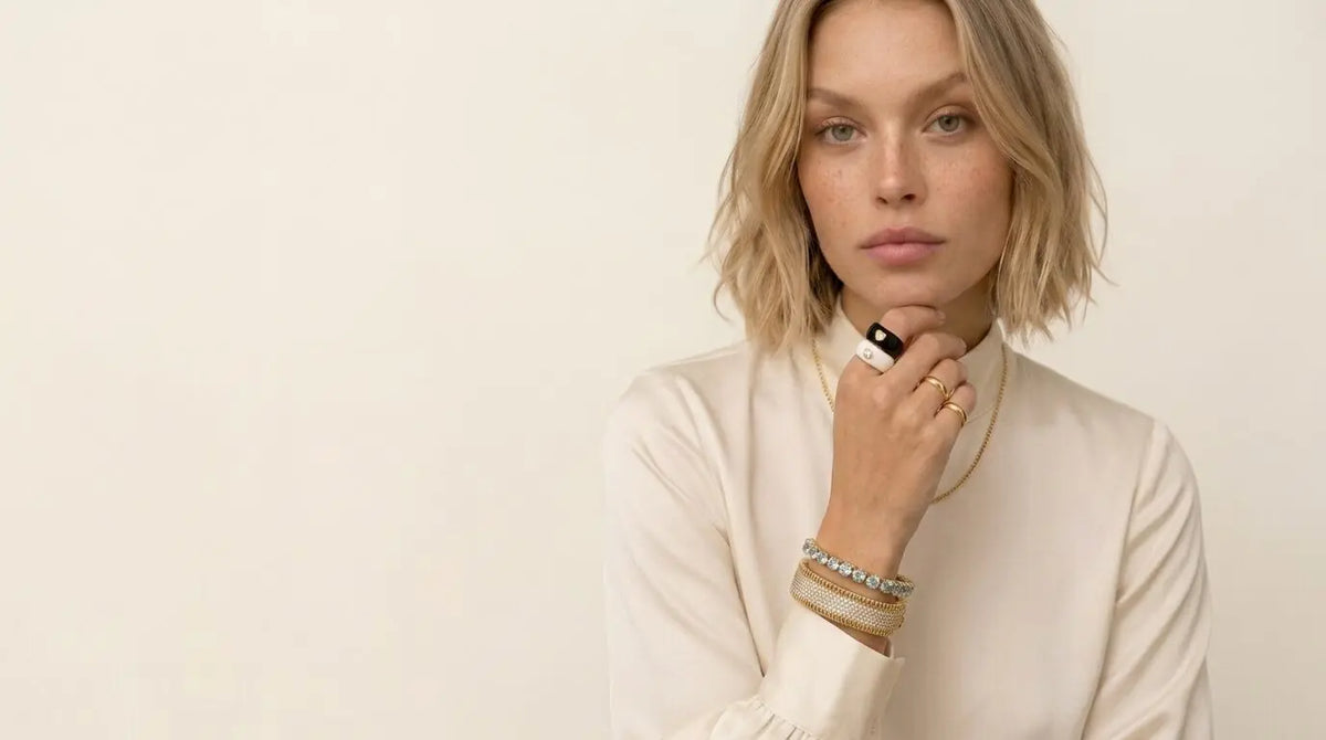 Boss Up Jewels homepage hero model wearing rings and bracelets