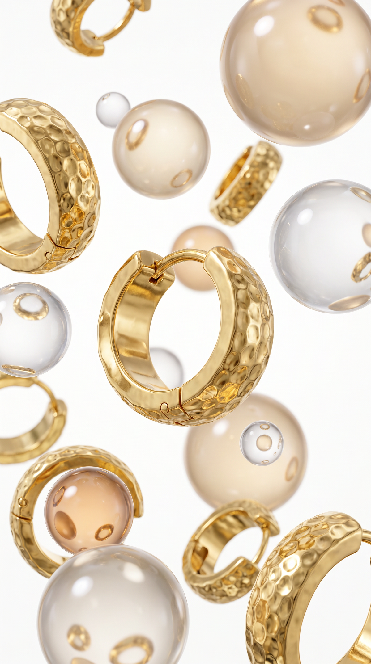Hoop Dreams Style 1 hammered gold huggie hoops floating among glass bubbles