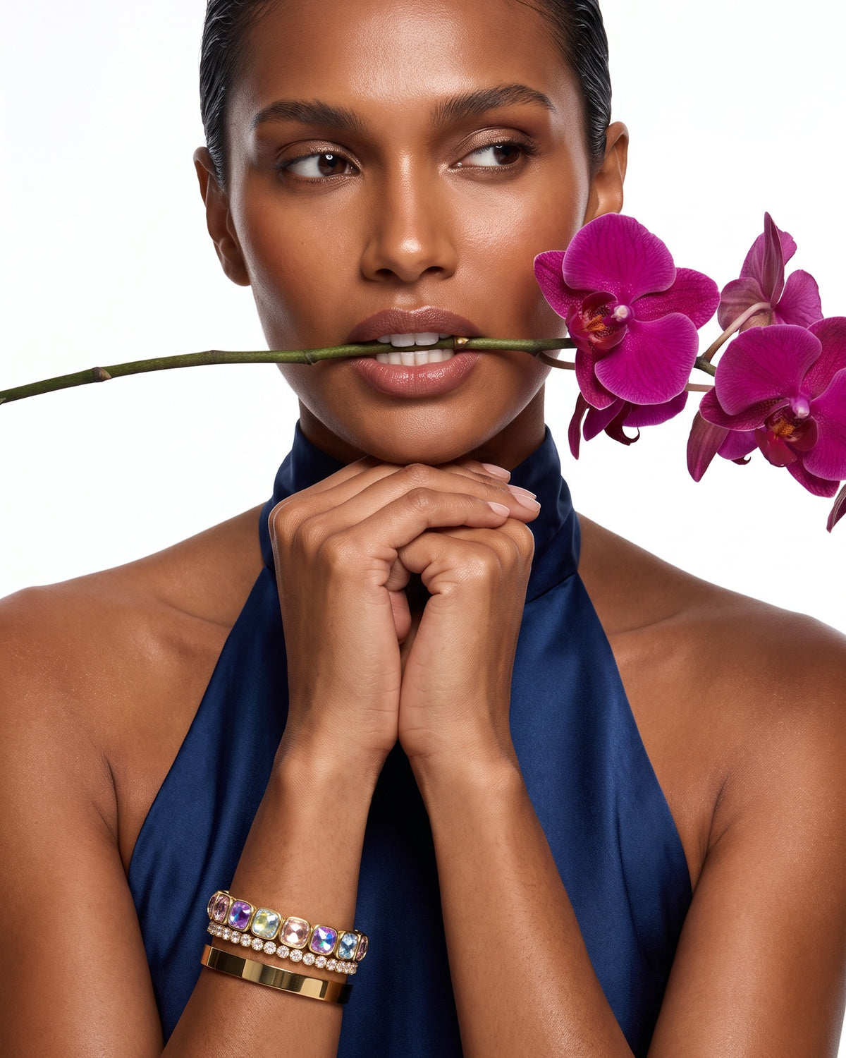 Northern Lights bracelet stacked on model with orchid