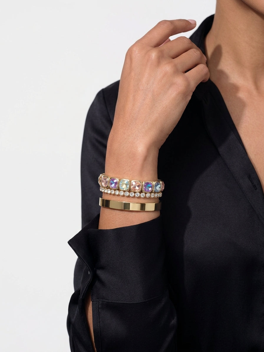 Northern Lights multicolor gemstone bracelet worn on model in a bracelet stack