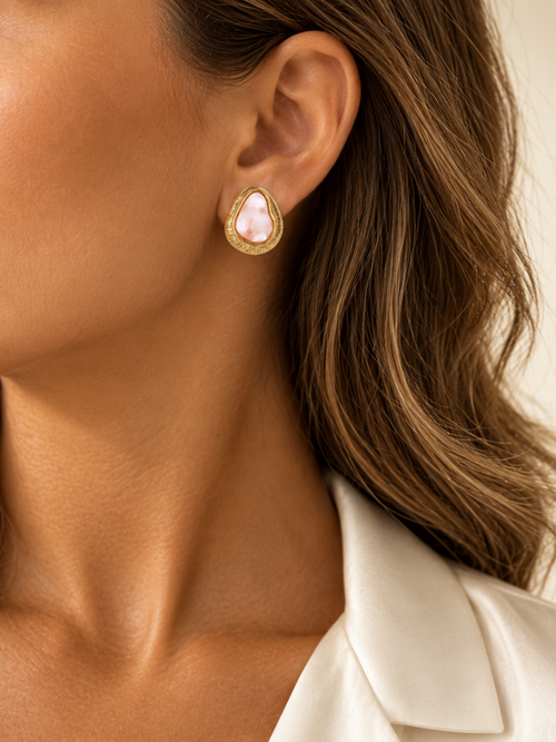 Organic Glow blush pink earrings worn on model