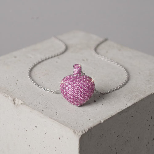 Be Still My Heart pink pendant shown in motion