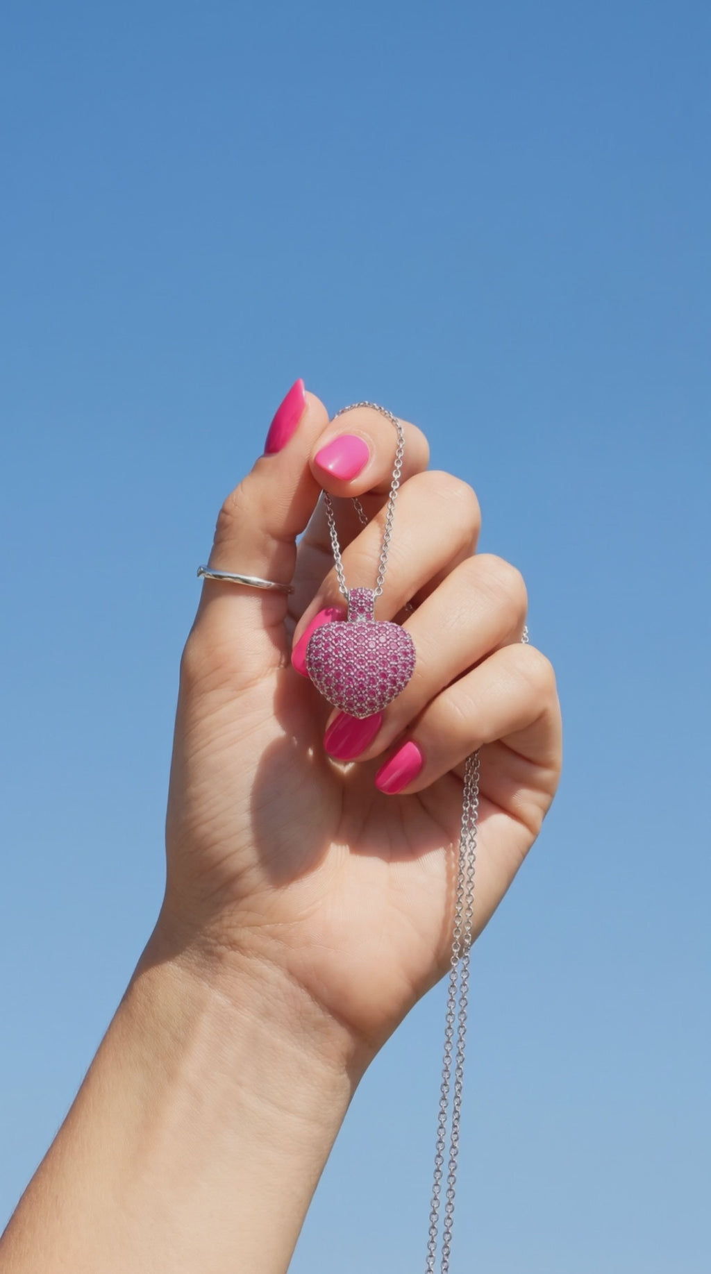 Be Still My Heart pink pavé heart pendant – macaw swoops in