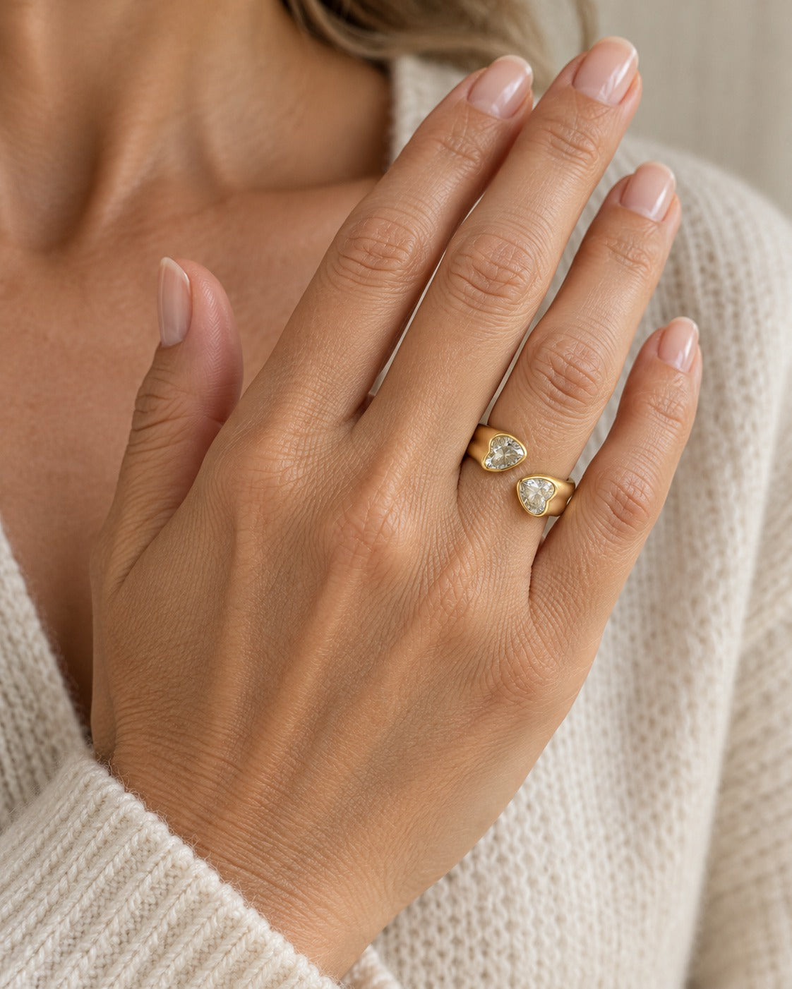 Twin Heart ring worn on the ring finger